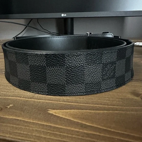 Louis Vuitton belt fits up to size 34